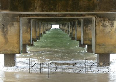 Under the pier, a photograph by Kristin Rongve